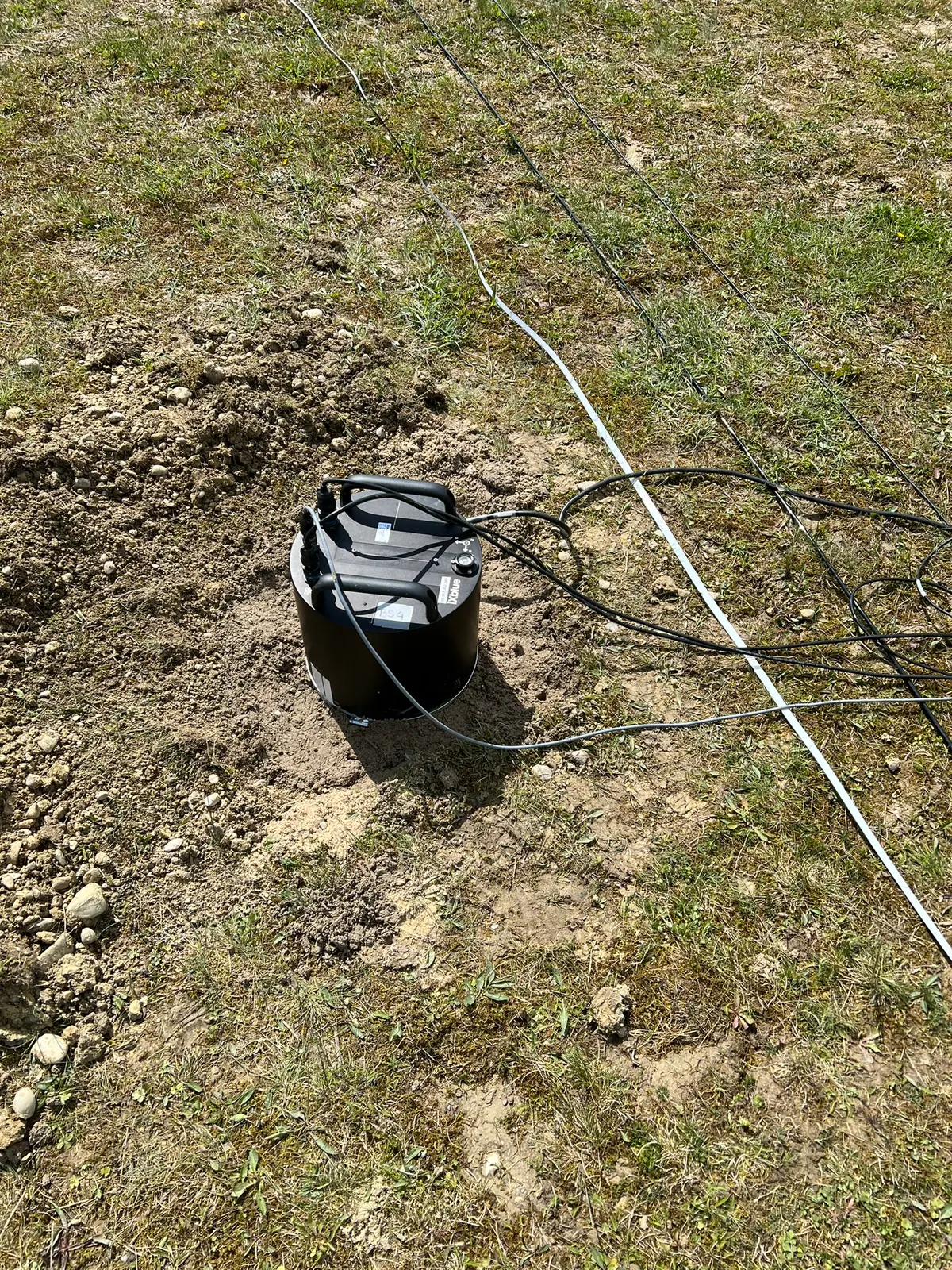 A deployed sensor and its cabling.